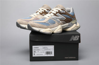 New Balance 9060 unisexsneakers bruna och blå