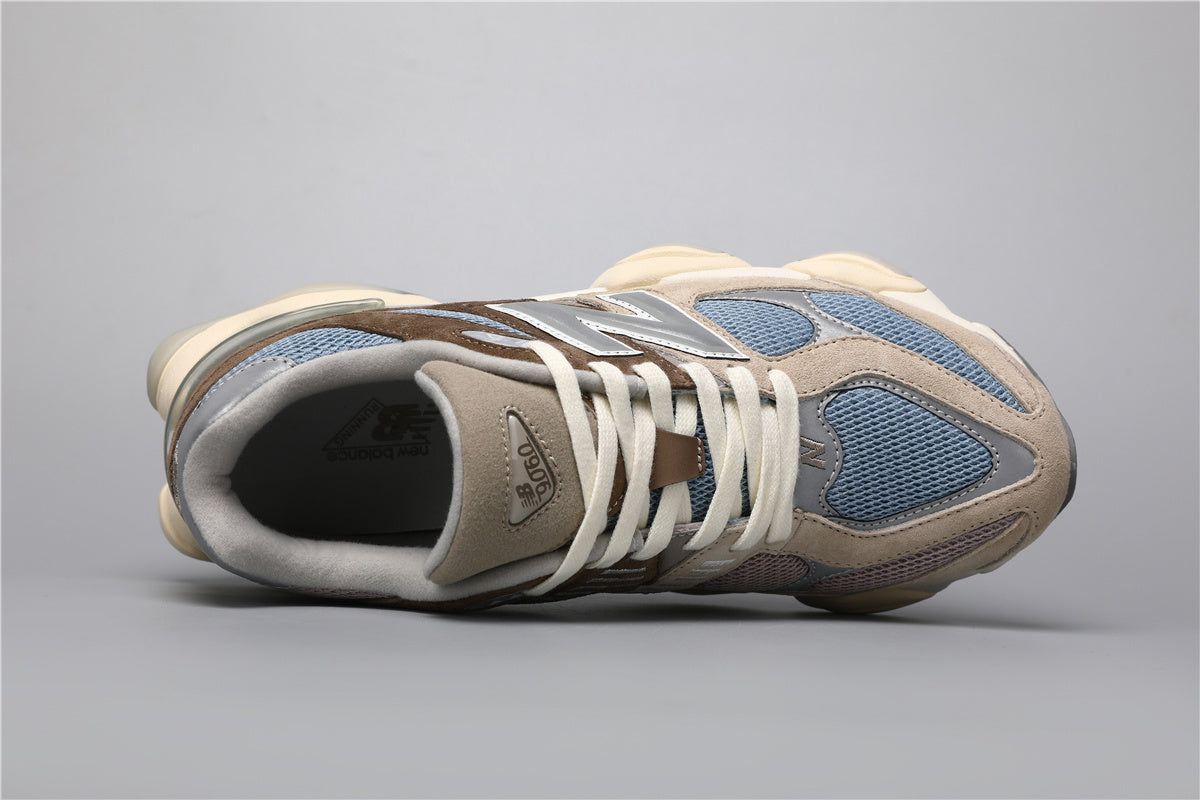 New Balance 9060 unisexsneakers bruna och blå