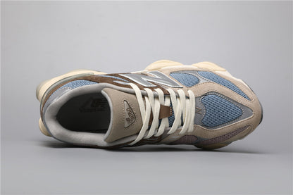 New Balance 9060 unisexsneakers bruna och blå